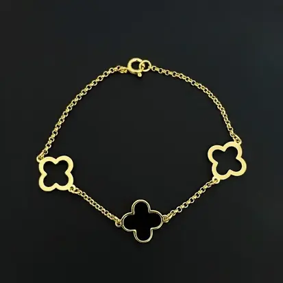 PULSEIRA DOURADA TREVOS 2 VAZADOS 1 RESINADO